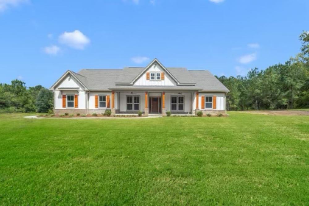 Single-storey custom home on a wide lawn