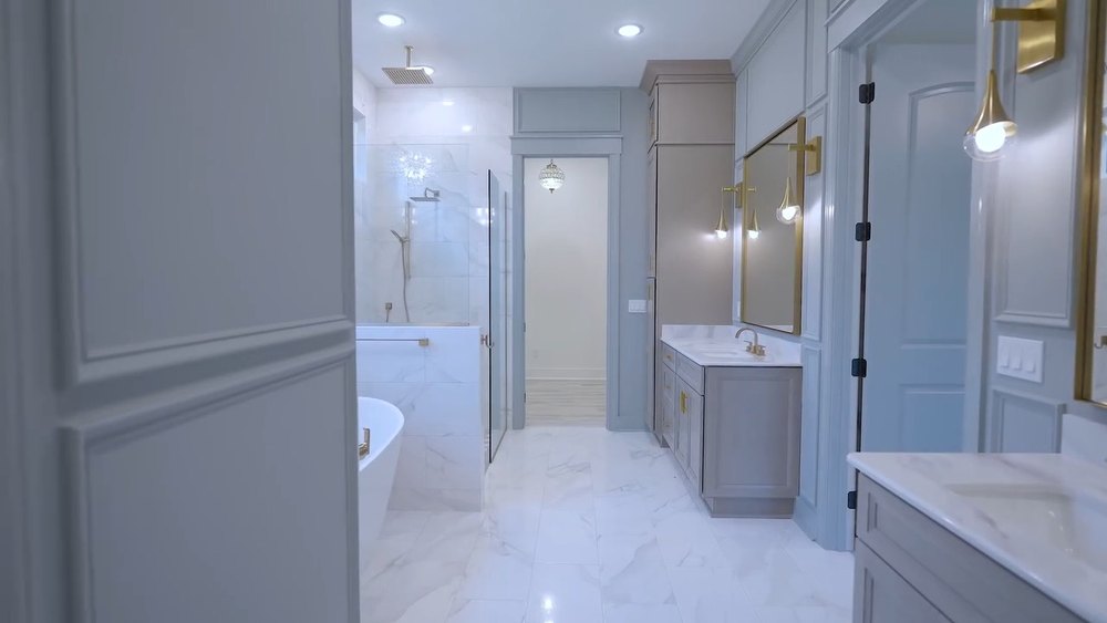 Primary bathroom with a freestanding tub and tiled walk-in shower