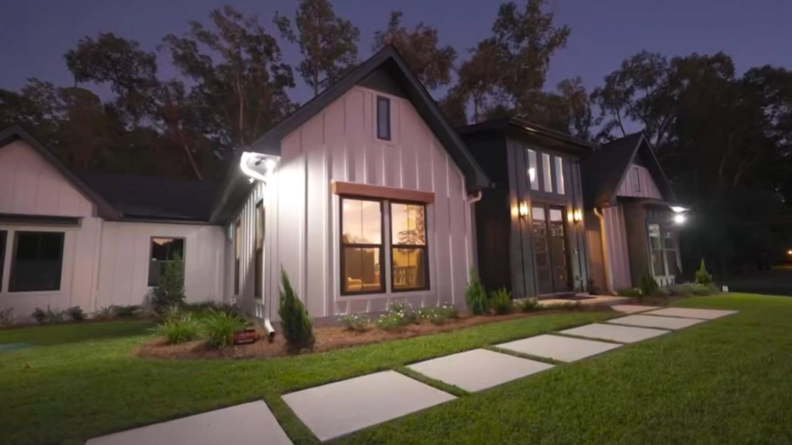 A custom home built by JSR Construction at dusk