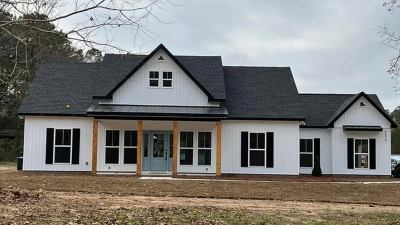 Custom home exterior with board-and-batten siding built by JSR Construction